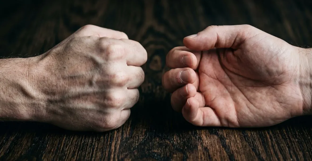 Close-up of hands showing stress and professional composure